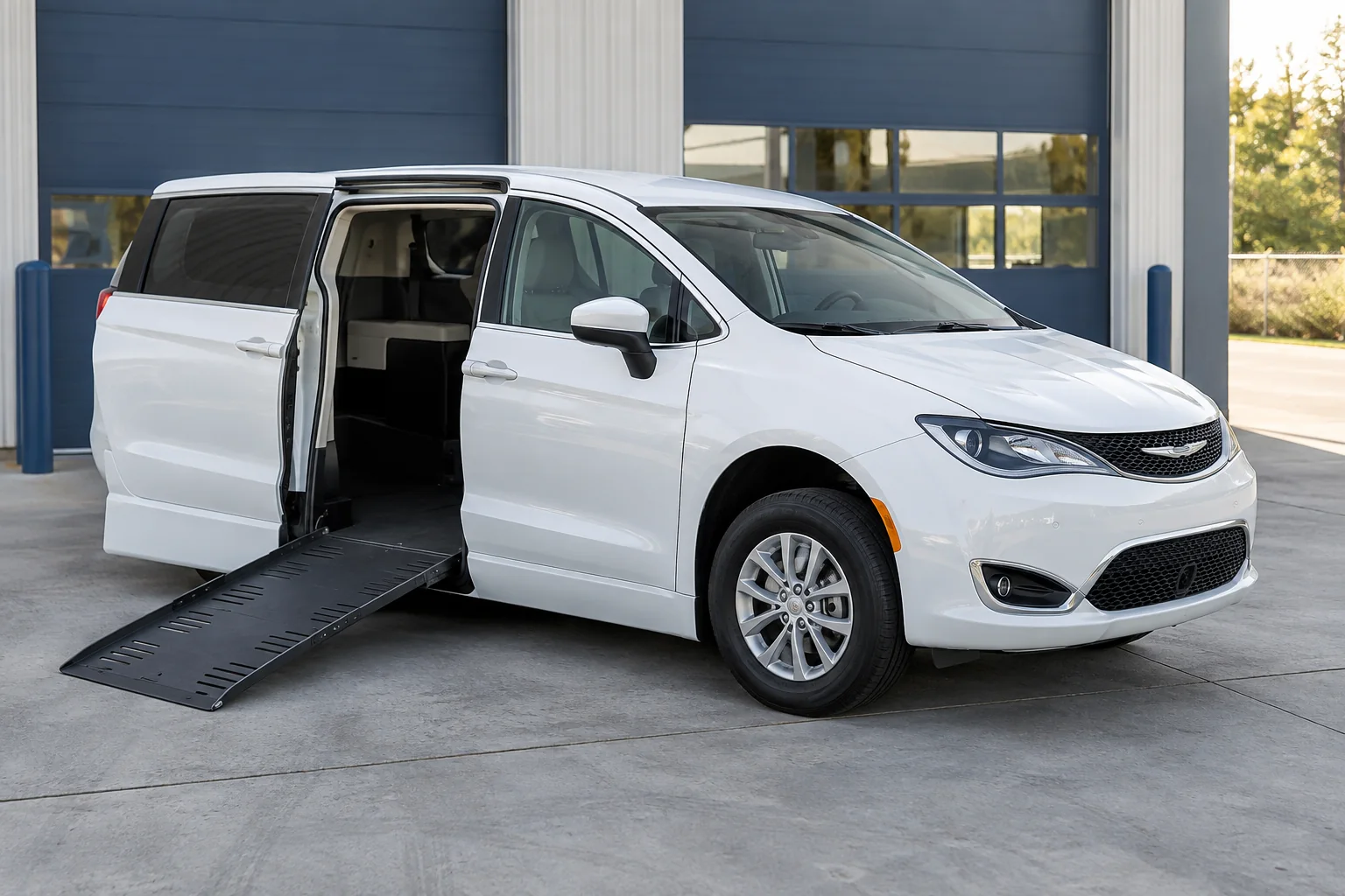 Intact white wheelchair van parked calmly in clean depot bay, undamaged ordinary vehicle scene.
